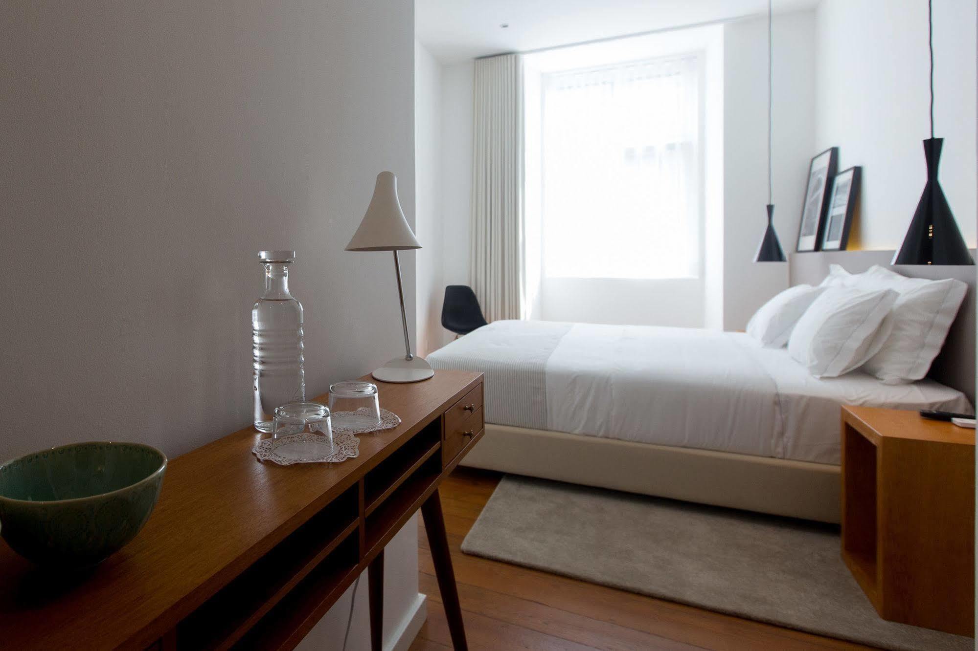 The 8 - Downtown Suites Lisboa Dış mekan fotoğraf A bedroom at the hotel