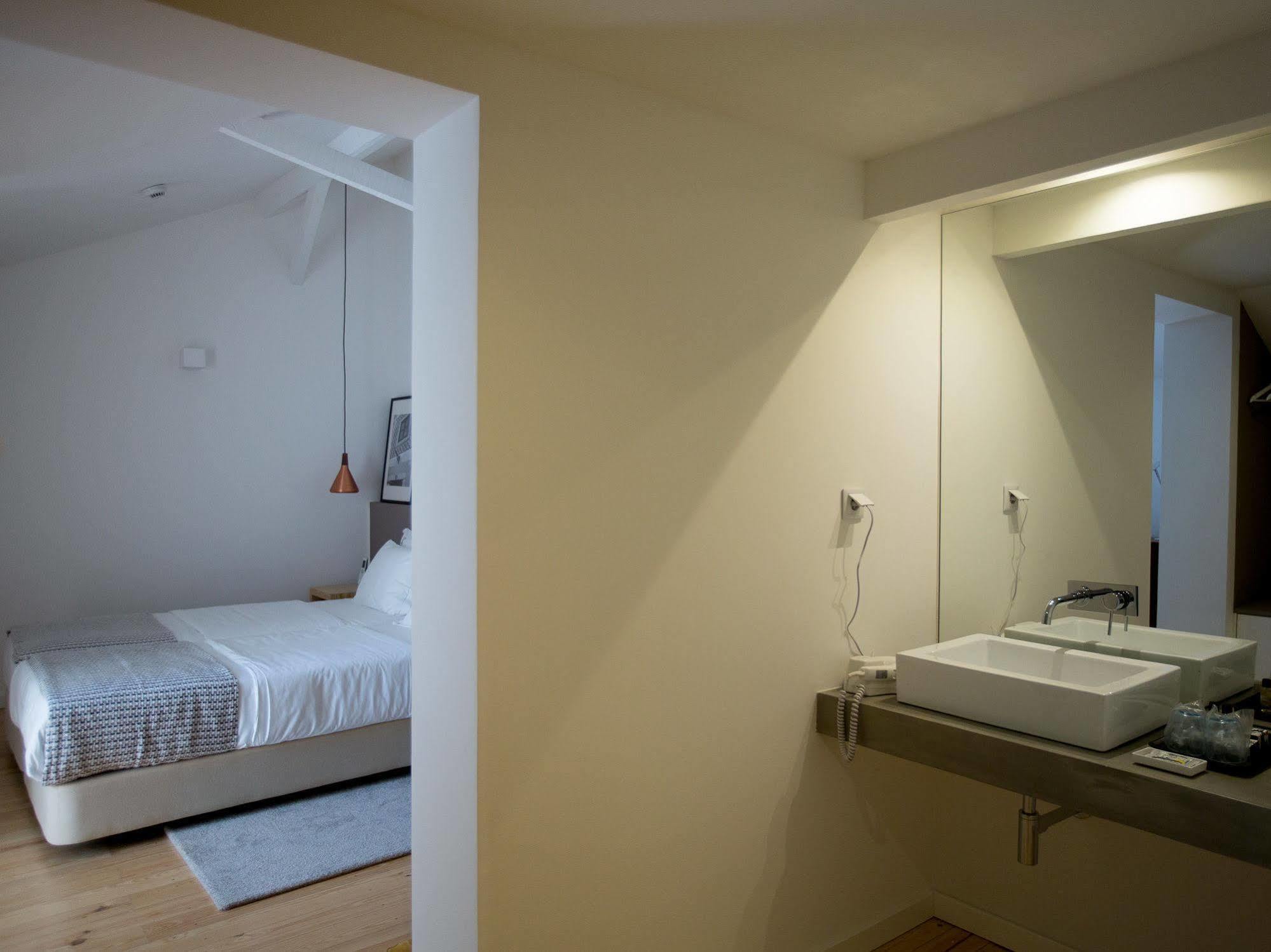 The 8 - Downtown Suites Lisboa Dış mekan fotoğraf A room at the hotel